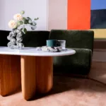 Antibes coffee table with green marble top in a styled interior
