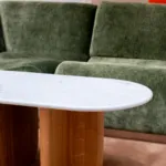 Antibes coffee table with green marble top, three-quarter view