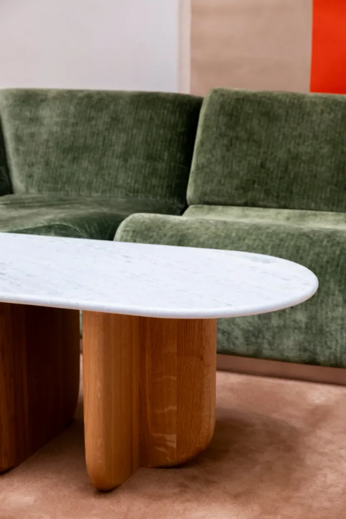 Antibes coffee table with green marble top, three-quarter view
