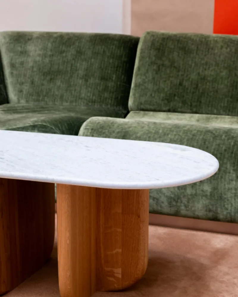 Antibes coffee table with green marble top, three-quarter view