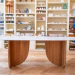 Antibes dining table with green marble top in the boutique