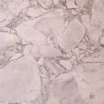 White marble pattern detail for the Antibes dining table