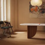 Antibes dining table with a Bianco marble top under a paper pendant lamp